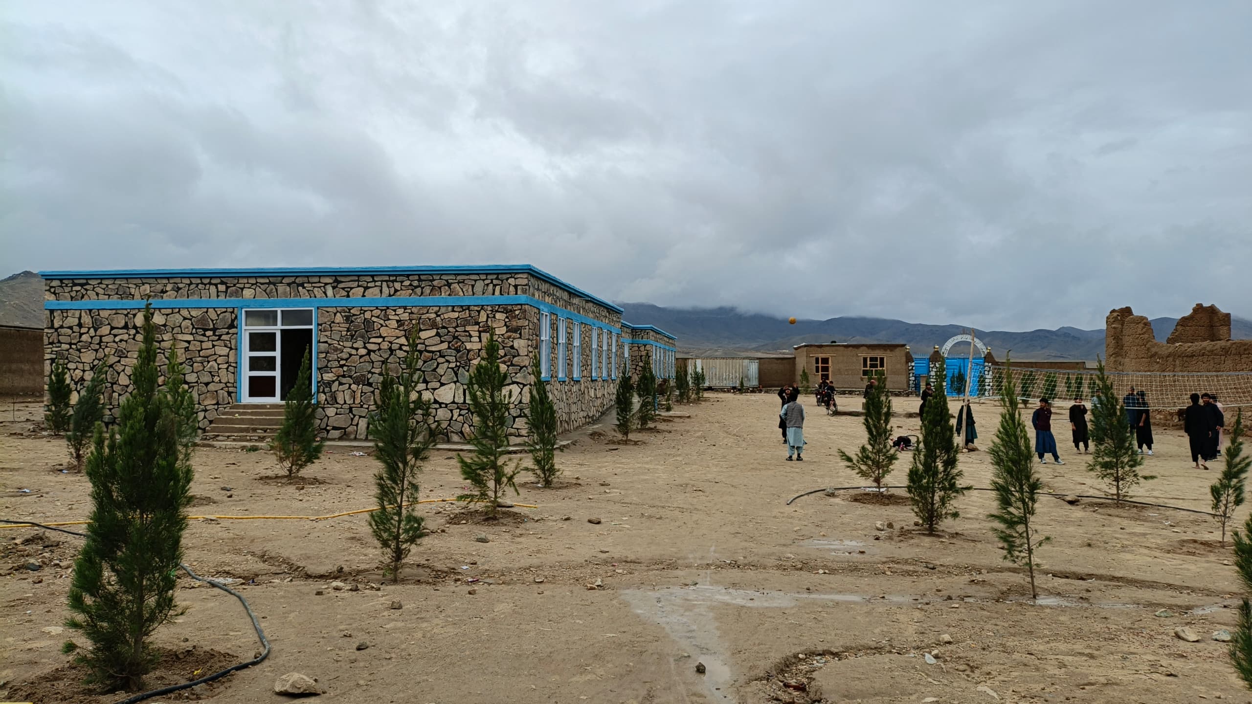 Students playing in the completed Baghak Lycee courtyard
